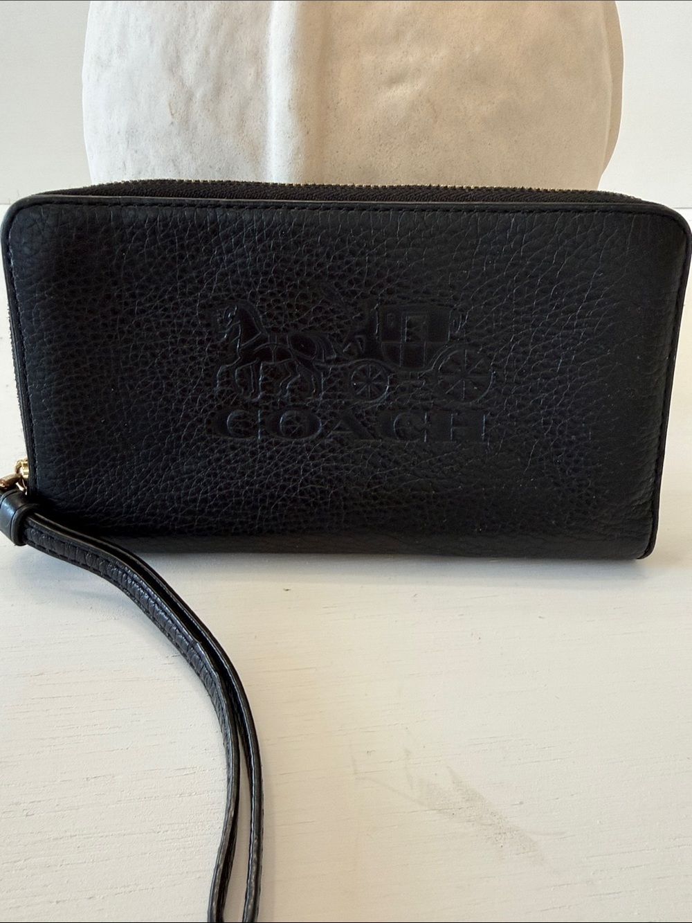 COACH Black Pebbled Leather Zip-Around Wristlet with Embossed Logo